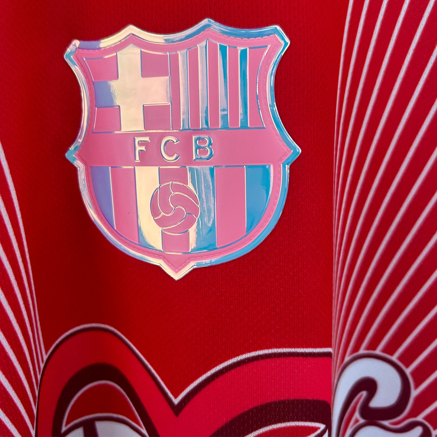 Red FC Barcelona x Karol G kit by ELVN, featuring team logo and stylish design, displayed on a mannequin.