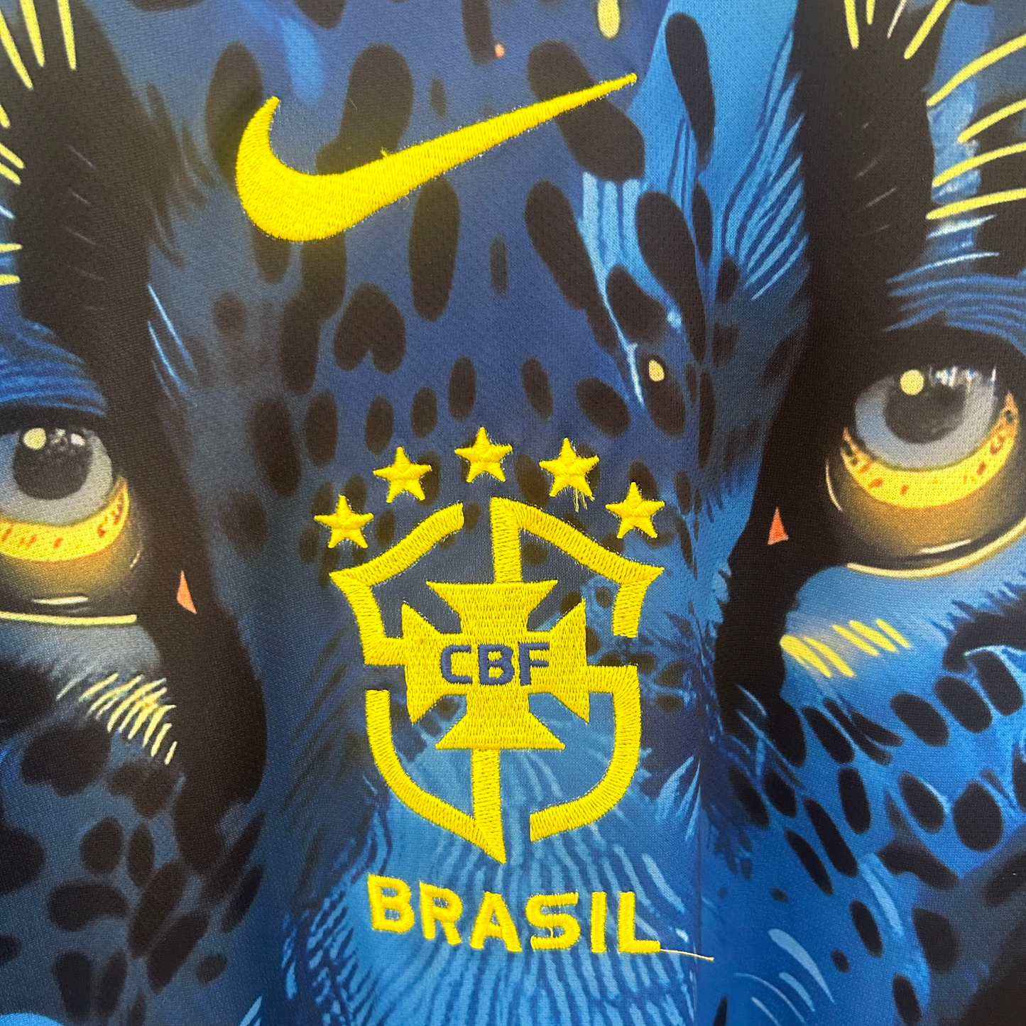 ELVN Brazil Panther Kit featuring a vibrant sports jersey and shorts in bold yellow and green colors.