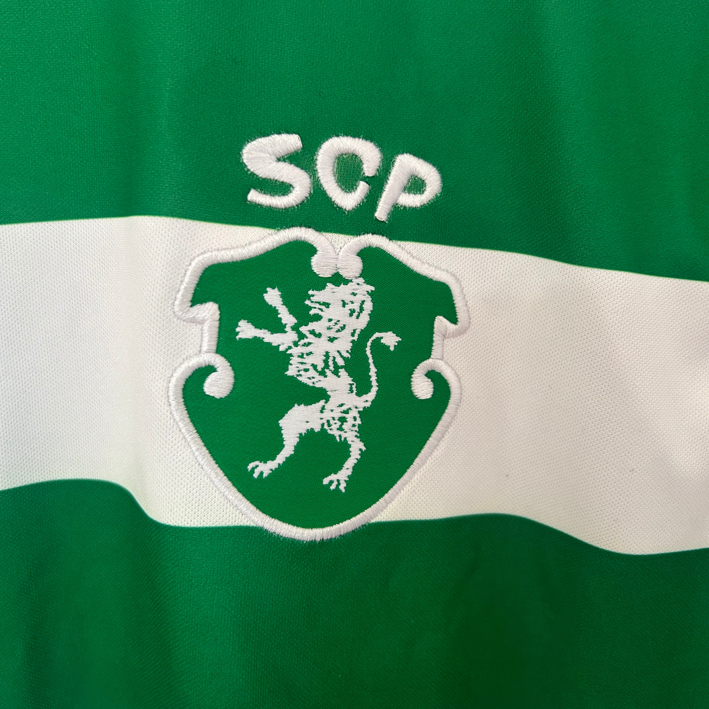 ELVN Sporting CP home kit 2025/26 featuring the team crest, red and green jersey design, and matching shorts.