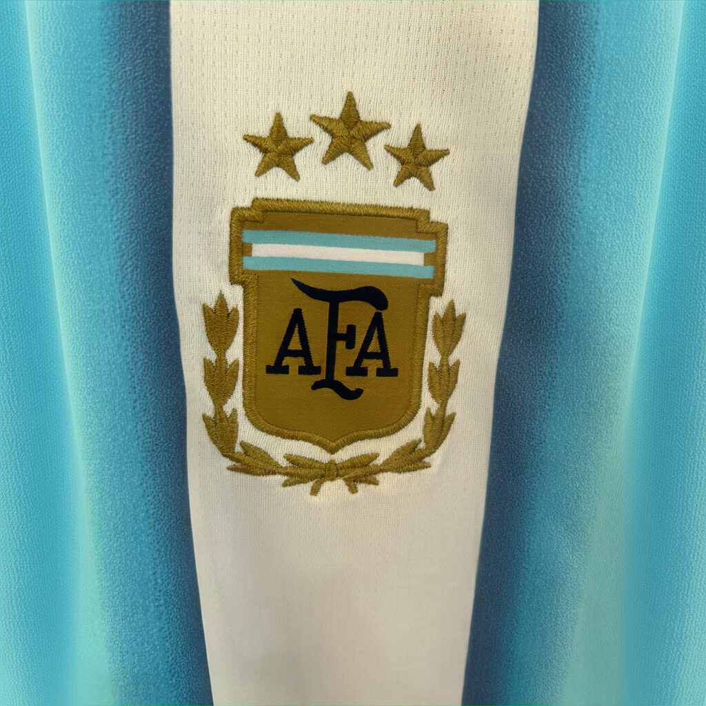 Argentina home football kit 2026 by ELVN featuring the team's iconic blue and white jersey with national crest.
