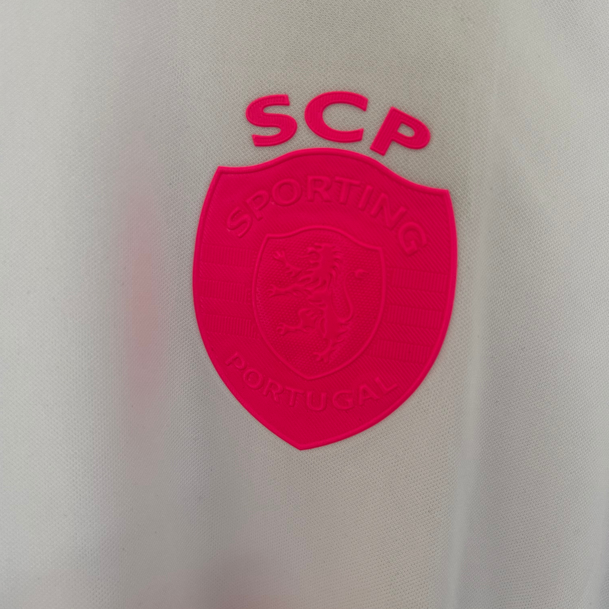 ELVN Sporting CP Pink October kit featuring pink jersey with team logo and matching shorts, designed for fans and supporters.