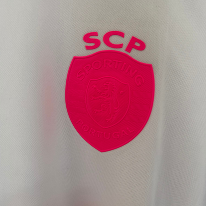 ELVN Sporting CP Pink October kit featuring pink jersey with team logo and matching shorts, designed for fans and supporters.
