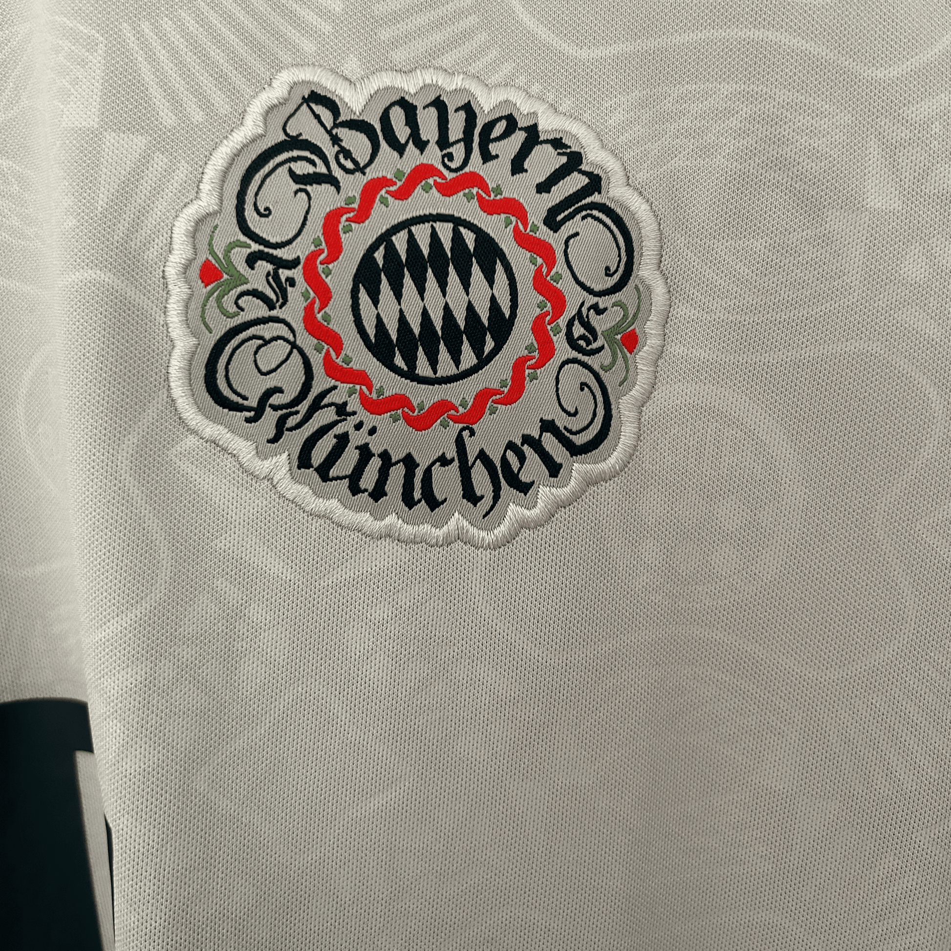 FC Bayern Munich Oktoberfest kit by ELVN featuring a traditional green and white themed sports jersey with Bayern Munich logo.