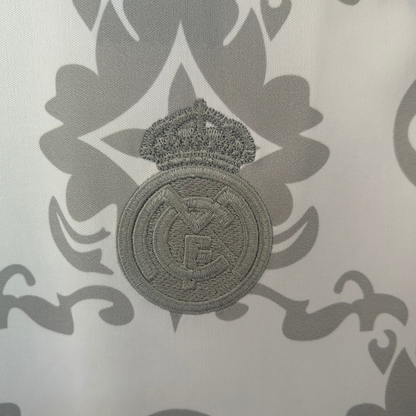 Real Madrid and Louis Vuitton branded sports kit by ELVN featuring the team logo and luxury design elements.