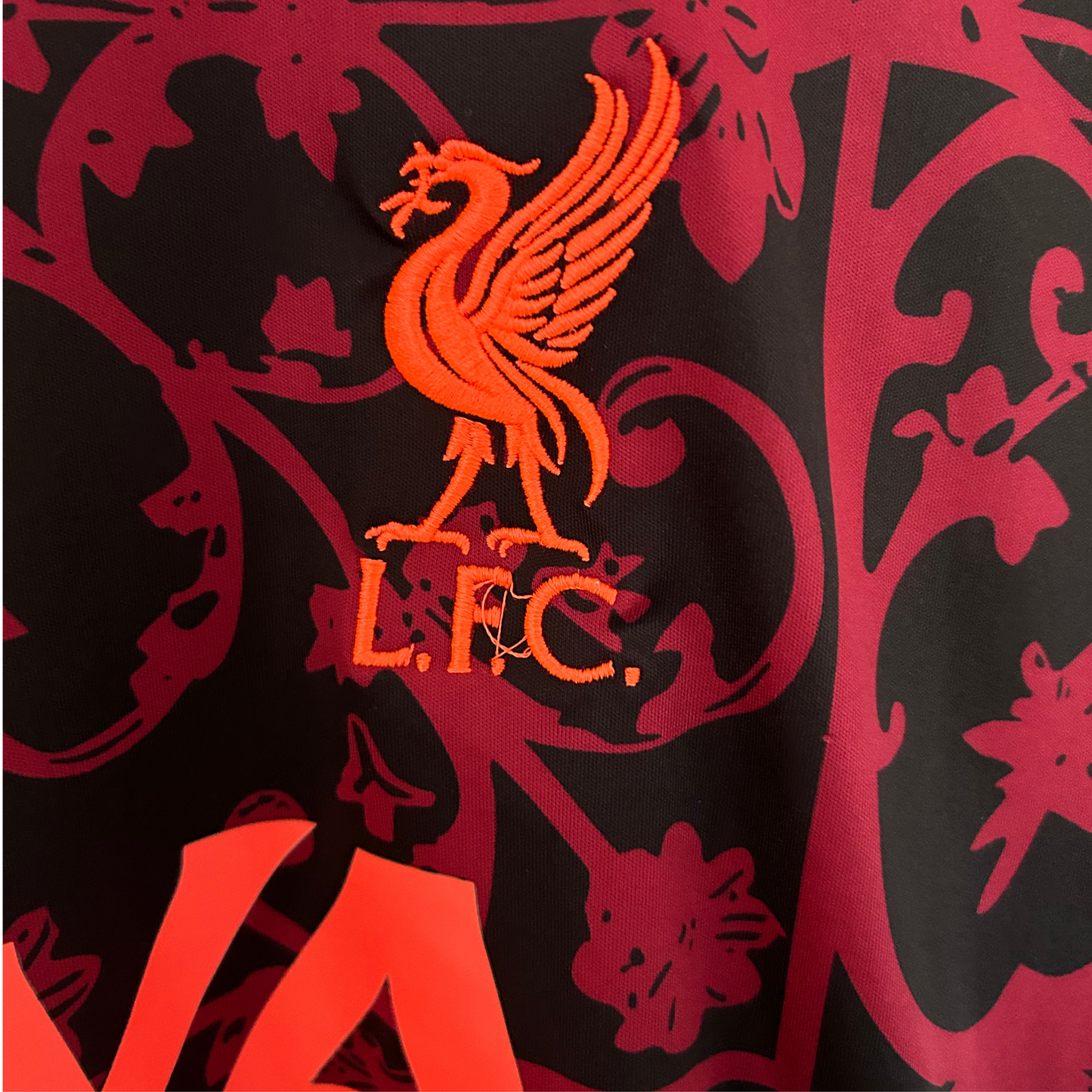 Liverpool pre-match kit 2025/26 by ELVN featuring team crest, jersey with red and white design, and matching shorts.