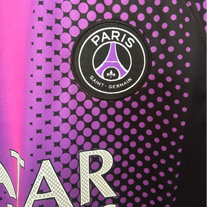 ELVN PSG x Jordan pre-match kit featuring a navy blue jersey with red and white accents and matching shorts, designed for football fans.