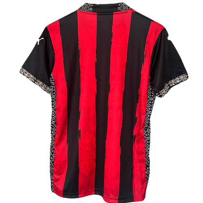 AC Milan Rosso Nero football kit by ELVN, featuring the team's red and black jersey with team logo and matching shorts.