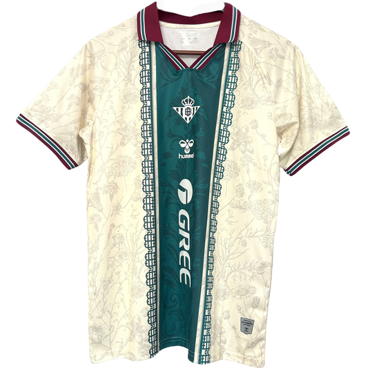 Real Betis heritage football kit by ELVN, featuring green and white stripes with team crest and sponsor logos on the jersey.