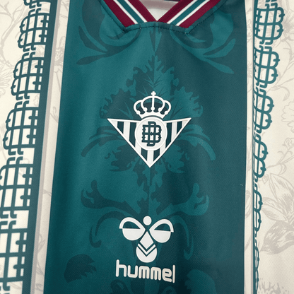 Real Betis heritage kit by ELVN, featuring green and white striped jersey with club crest and authentic team details.