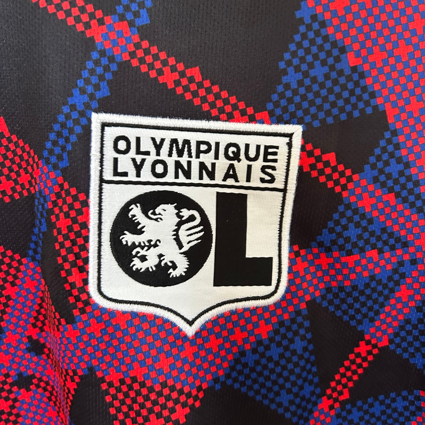 ELVN Olympique Lyon pre-match kit 2025/26, featuring team jersey and shorts in Lyon team colors, displayed on a flat surface.