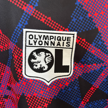 ELVN Olympique Lyon pre-match kit 2025/26, featuring team jersey and shorts in Lyon team colors, displayed on a flat surface.