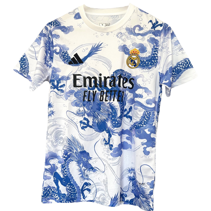 ELVN Real Madrid blue dragon kit jersey featuring the team logo and vibrant blue design, perfect for fans and sportswear enthusiasts.