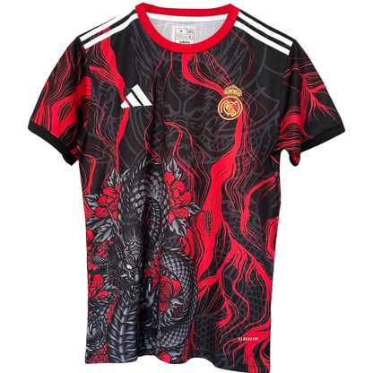 Real Madrid red dragon football kit by ELVN featuring the team crest and vibrant red design on a jersey.