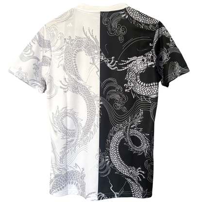 Real Madrid dragon white and black football kit by ELVN, featuring team crest and detailed design elements on jersey.