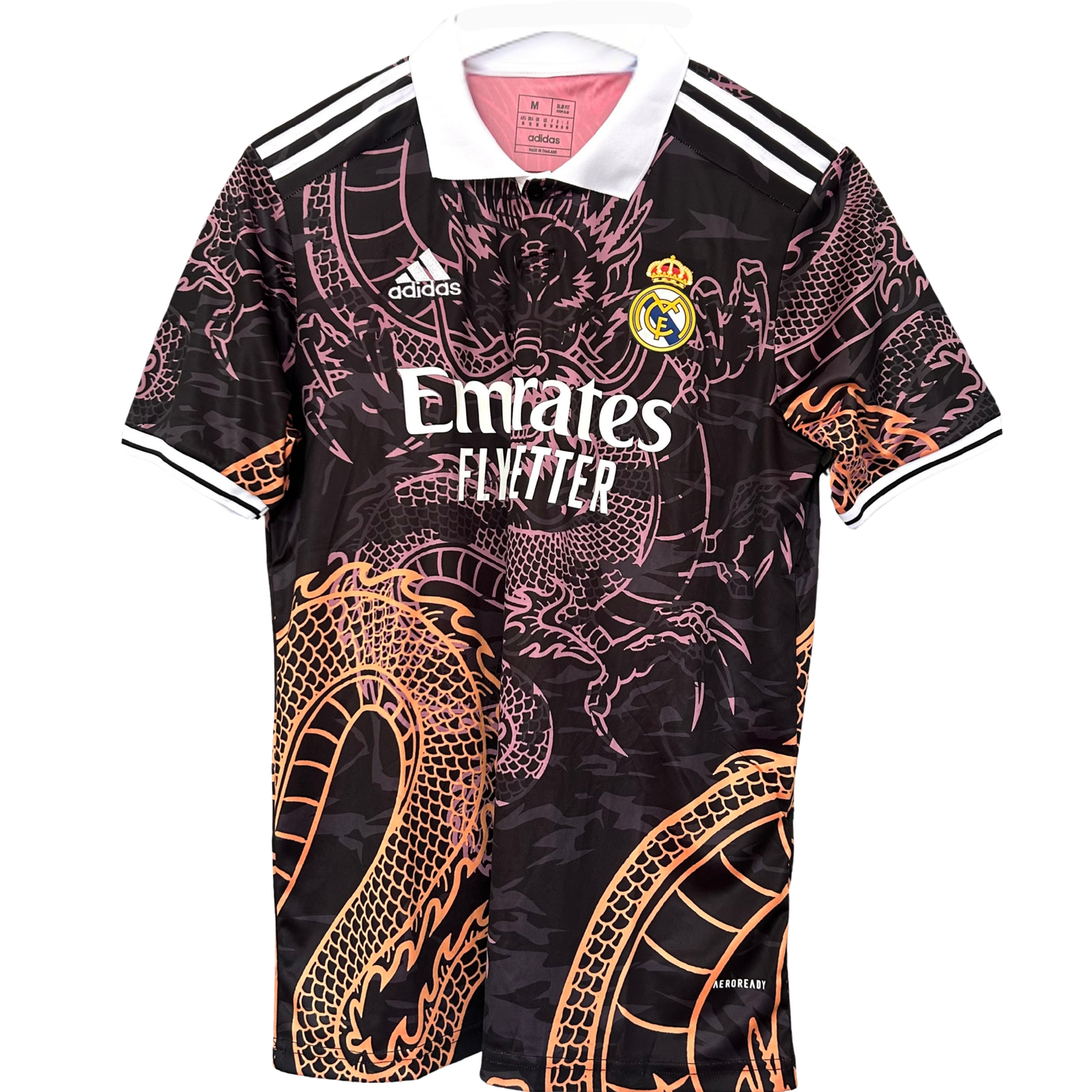 Real Madrid dragon kit by ELVN featuring a team jersey with dragon graphics and vibrant team colors for fans.
