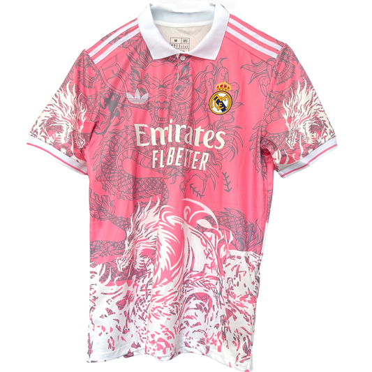 Real Madrid pink Dragon kit by ELVN featuring a pink soccer jersey with team logo and dragon design on the front.