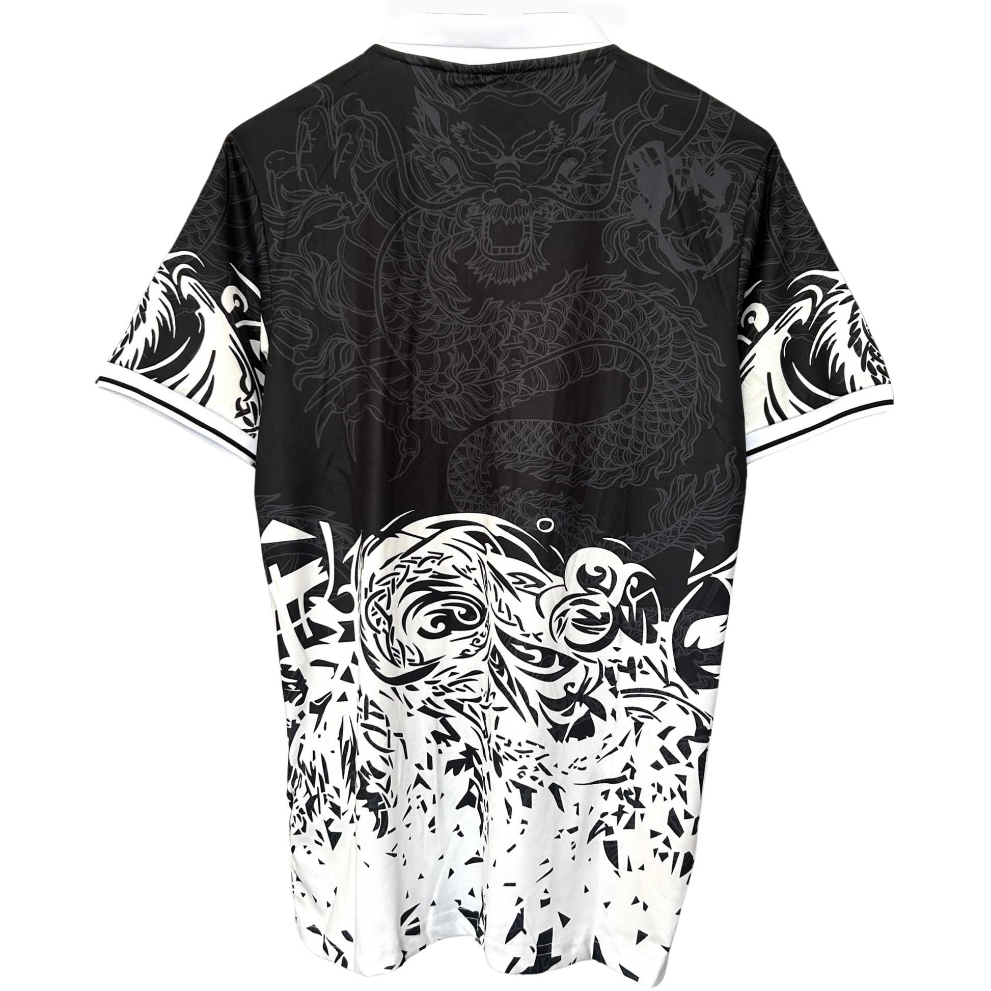 Real Madrid black dragon kit by ELVN, featuring the team jersey with dragon logo design on the front.