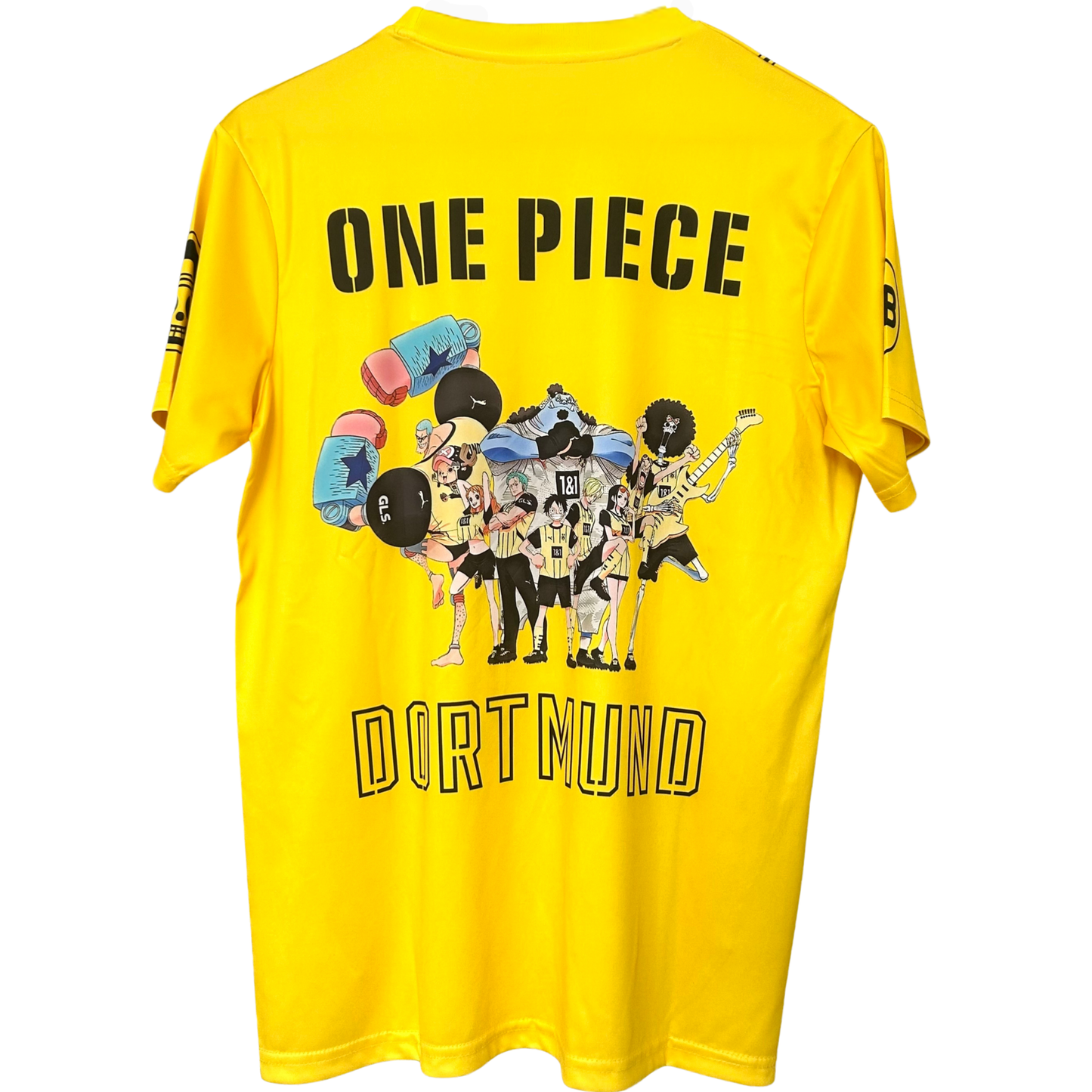 ELVN Borussia Dortmund X One Piece kit featuring team jersey with logo and design elements, displayed flat on a white background.