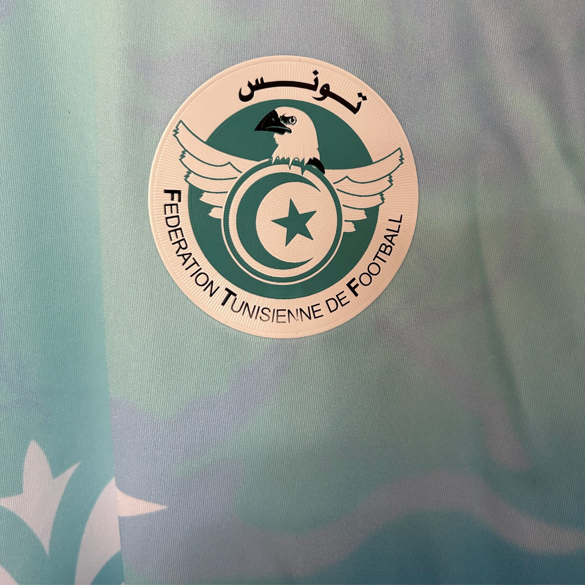ELVN Tunisia Ocean Kit featuring vibrant blue and green fabric pieces with intricate patterns and stitching on a plain background.