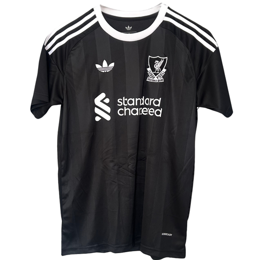 Liverpool third goalkeeper kit 2025/26 by ELVN featuring the team’s logo, vibrant green jersey, and matching shorts.