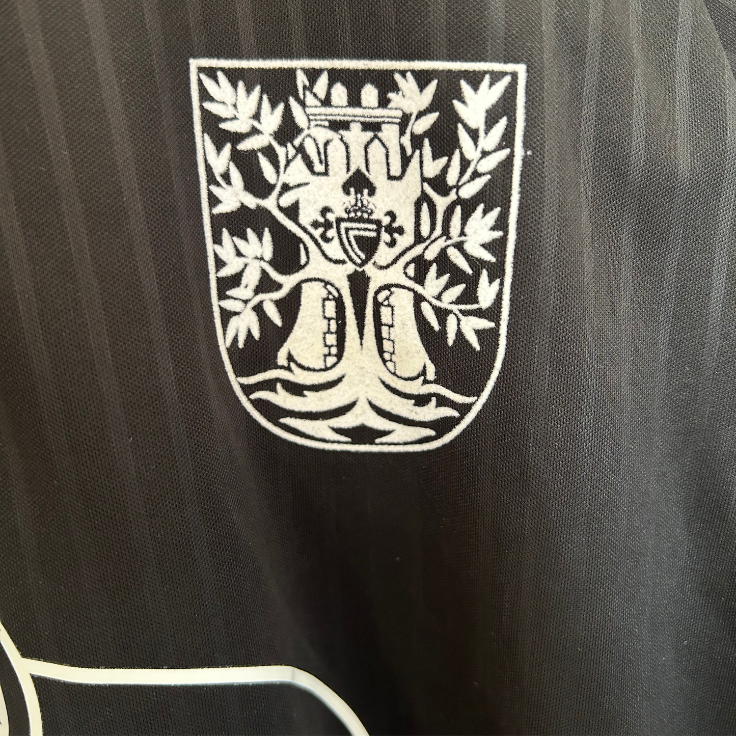 ELVN Celta de Vigo 100th anniversary black kit jersey displayed on a white background.