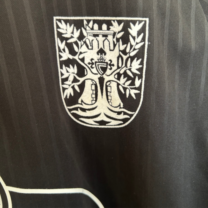 ELVN Celta de Vigo 100th anniversary black kit jersey displayed on a white background.