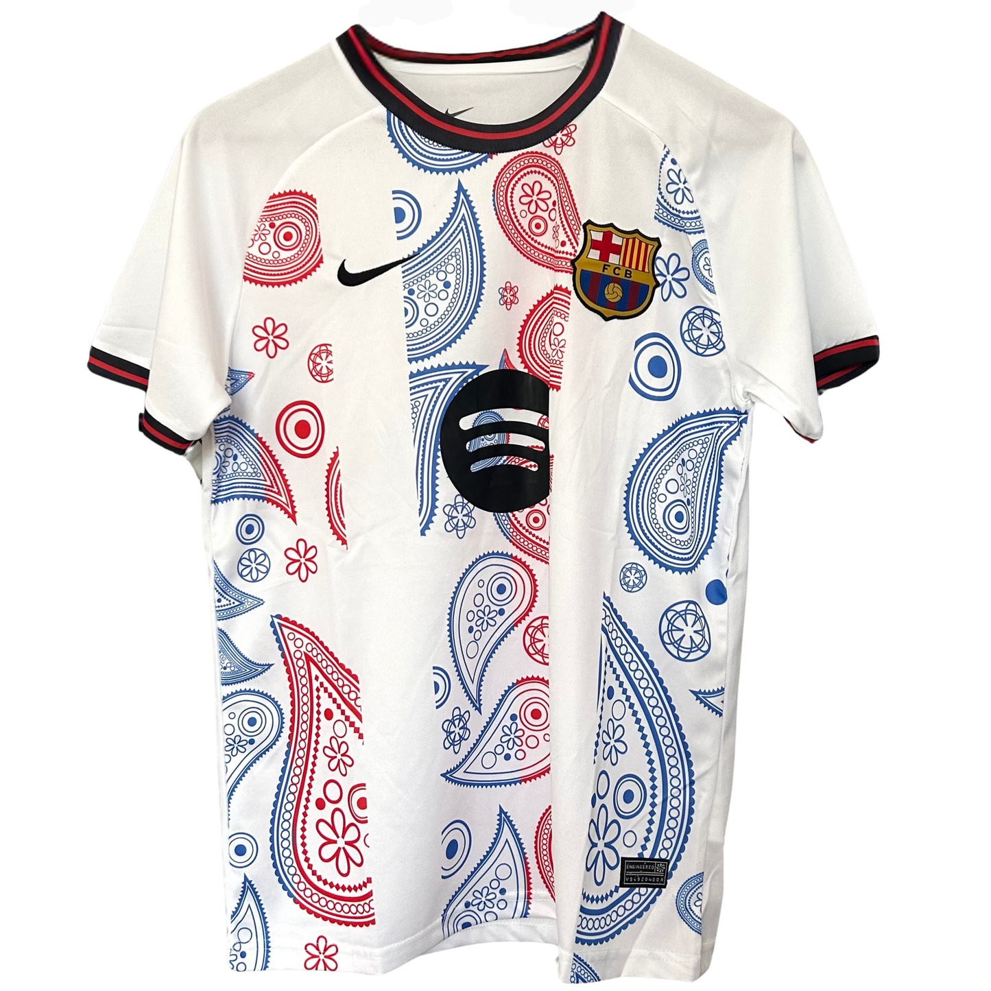FC Barcelona paisley white kit by ELVN, featuring the team's logo and distinctive paisley pattern on the jersey.