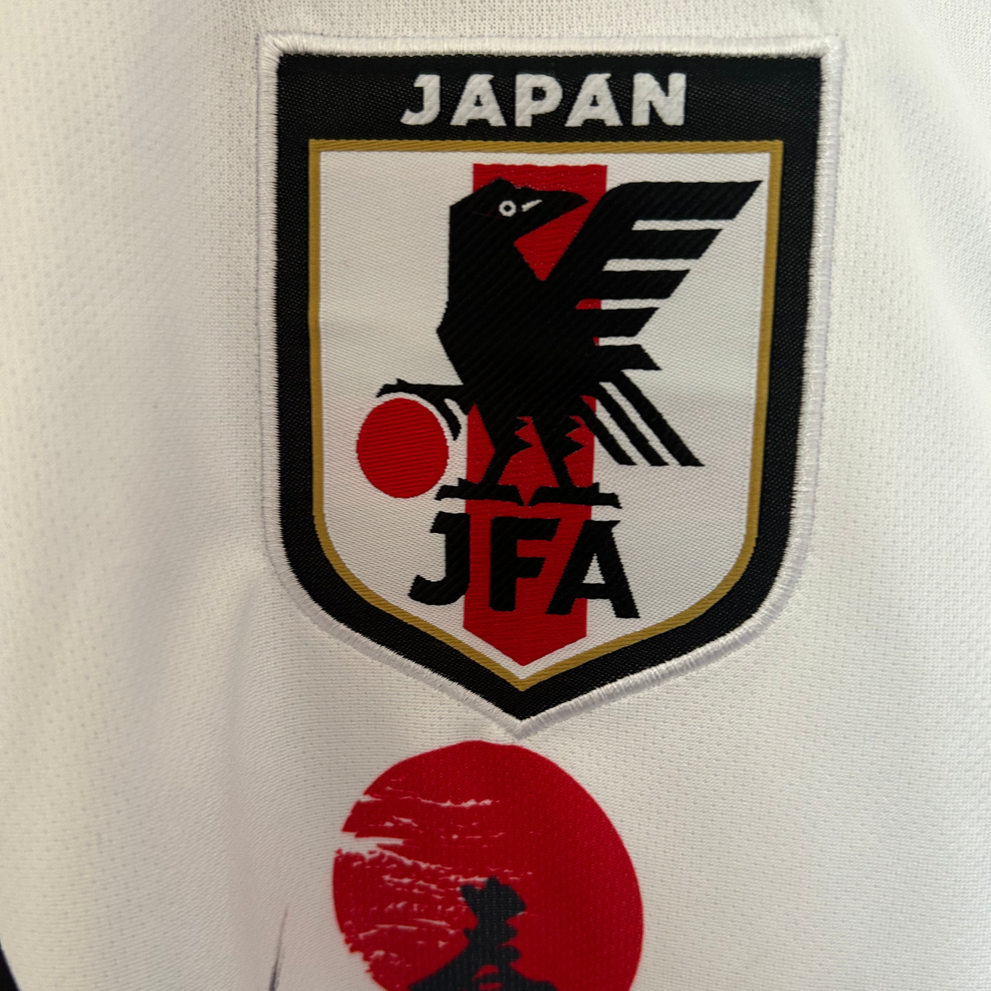 ELVN Japan x Naruto white kit featuring Naruto-themed clothing with Japanese design elements, perfect for anime fans.