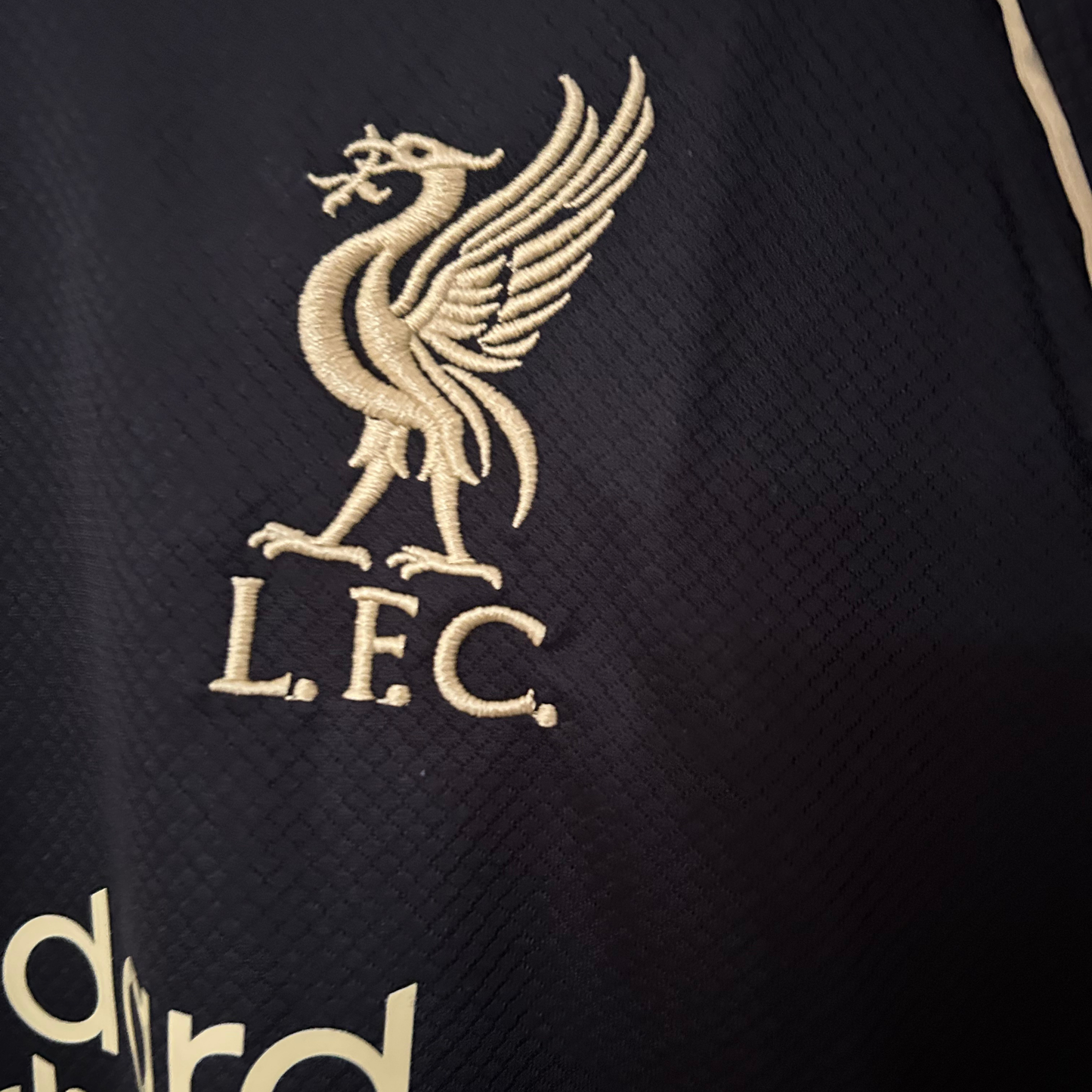 LIVERPOOL BLACK AND GOLD SHIRT 2025/26