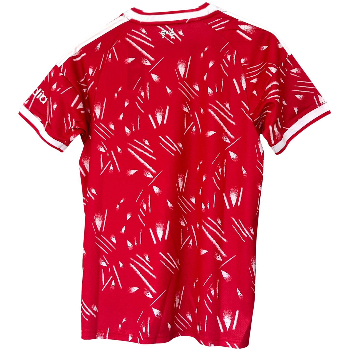 Liverpool home kit 2026/27 by ELVN featuring red jersey with team crest and white accents, displayed on a mannequin.