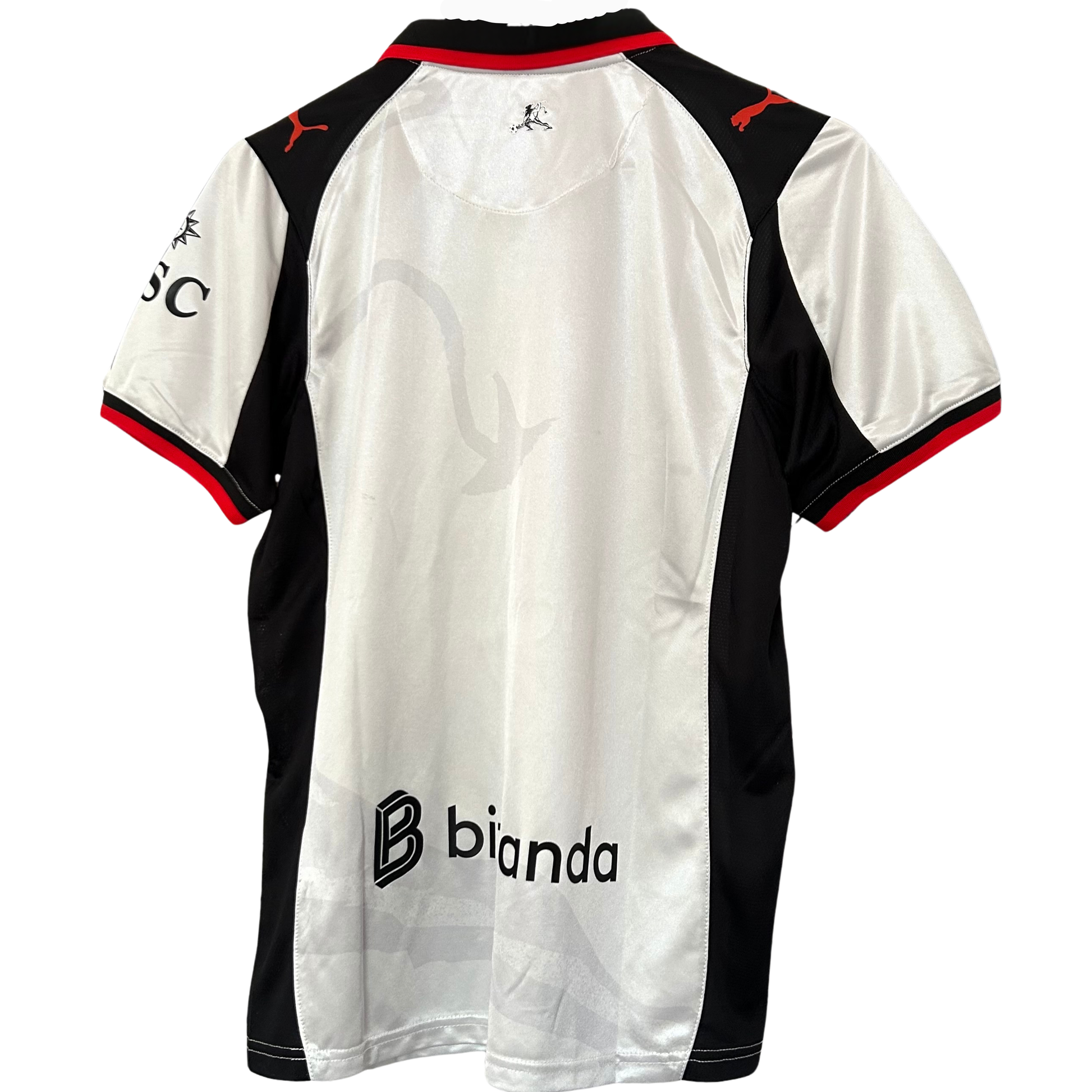 ELVN AC Milan x Slam Jam kit featuring a black and red jersey with matching shorts, displayed on a flat surface.