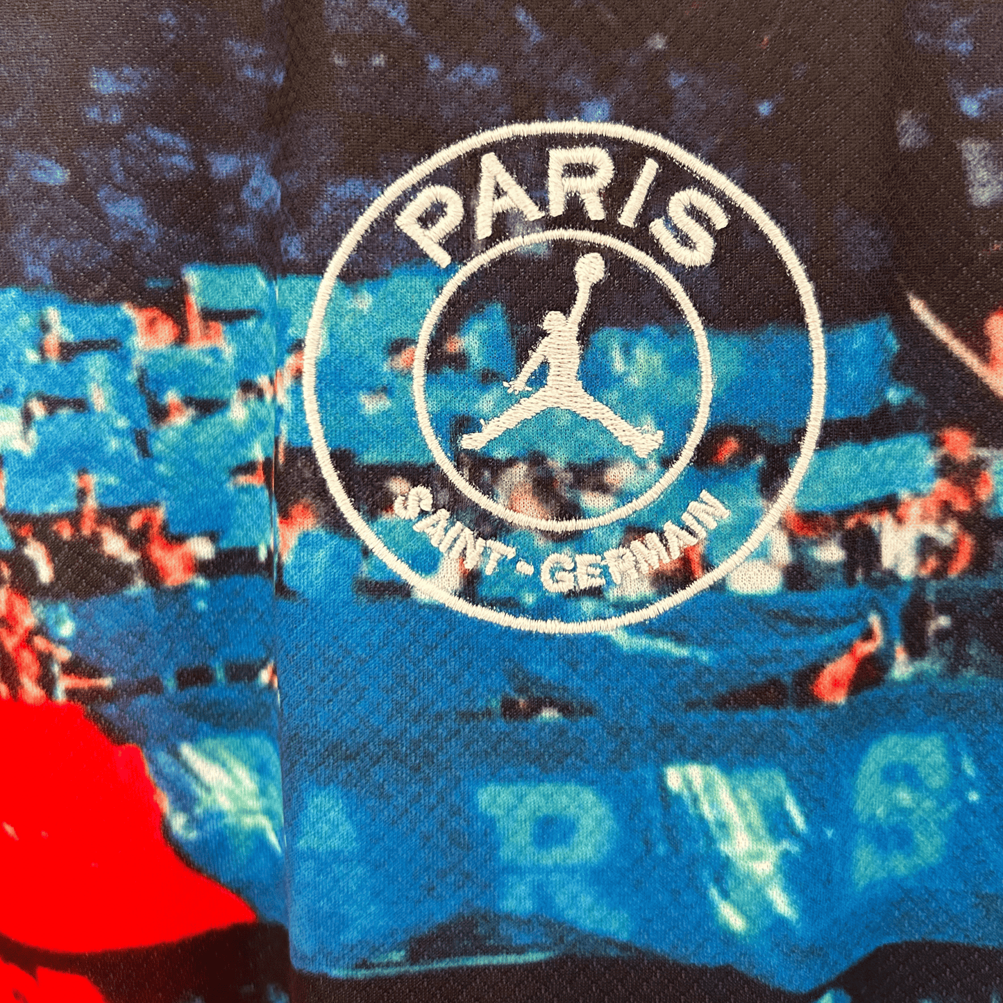 ELVN PSG X Jordan graphic kit featuring team logo and stylish design on a vibrant sportswear set.