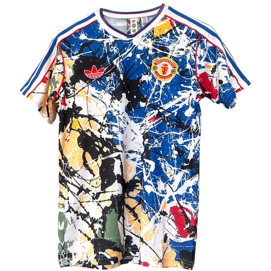 ELVN Manchester United Stone Roses kit featuring a sports shirt with Manchester United logo and decorative stone rose design.
