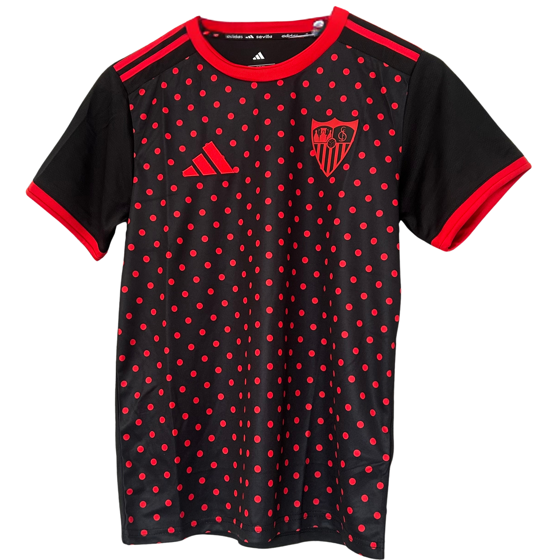 Sevilla FC pre-match kit 2025/26 by ELVN featuring team jersey, shorts, and socks in red and white with team logo.