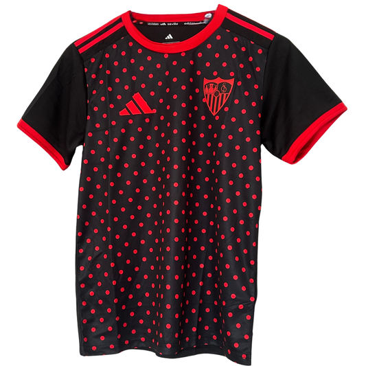 Sevilla FC pre-match kit 2025/26 by ELVN featuring team jersey, shorts, and socks in red and white with team logo.