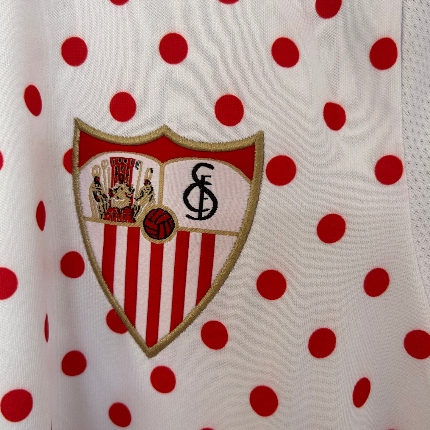 SEVILLA FC pre-match kit 2025/26 by ELVN, white jersey with team logo and design details visible in the image.