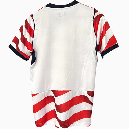 USA home kit 2026 soccer jersey by ELVN, featuring team crest and patriotic design with red, white, and blue accents.
