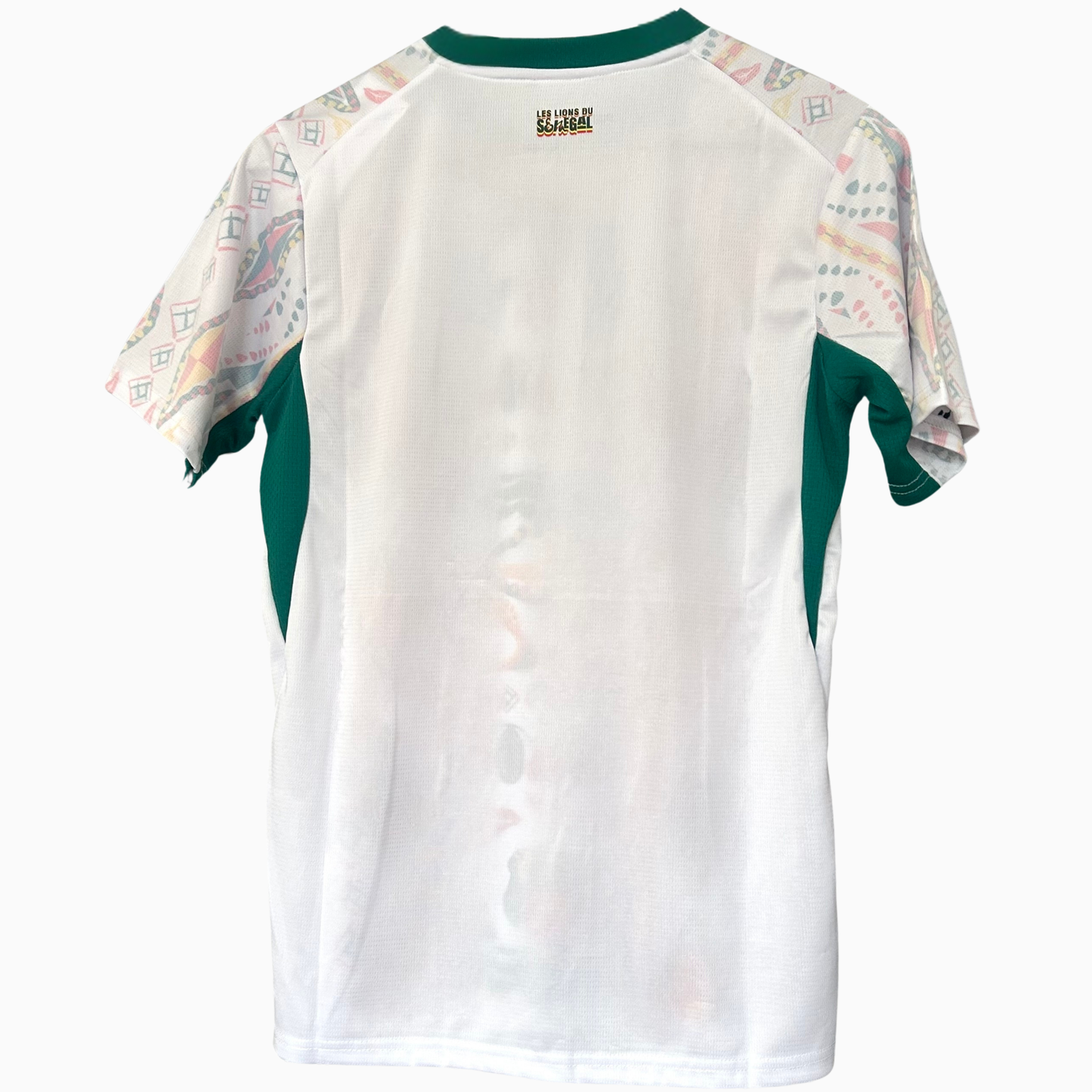 Senegal home kit 2026 soccer jersey by ELVN, featuring team crest and vibrant design, displayed on a flat surface.
