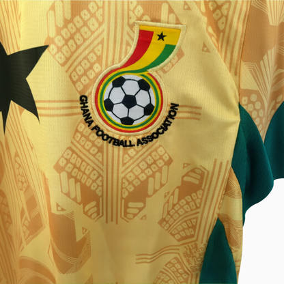 Ghana away football kit 2026 by ELVN featuring the team’s jersey with green and yellow accents and Ghana crest.
