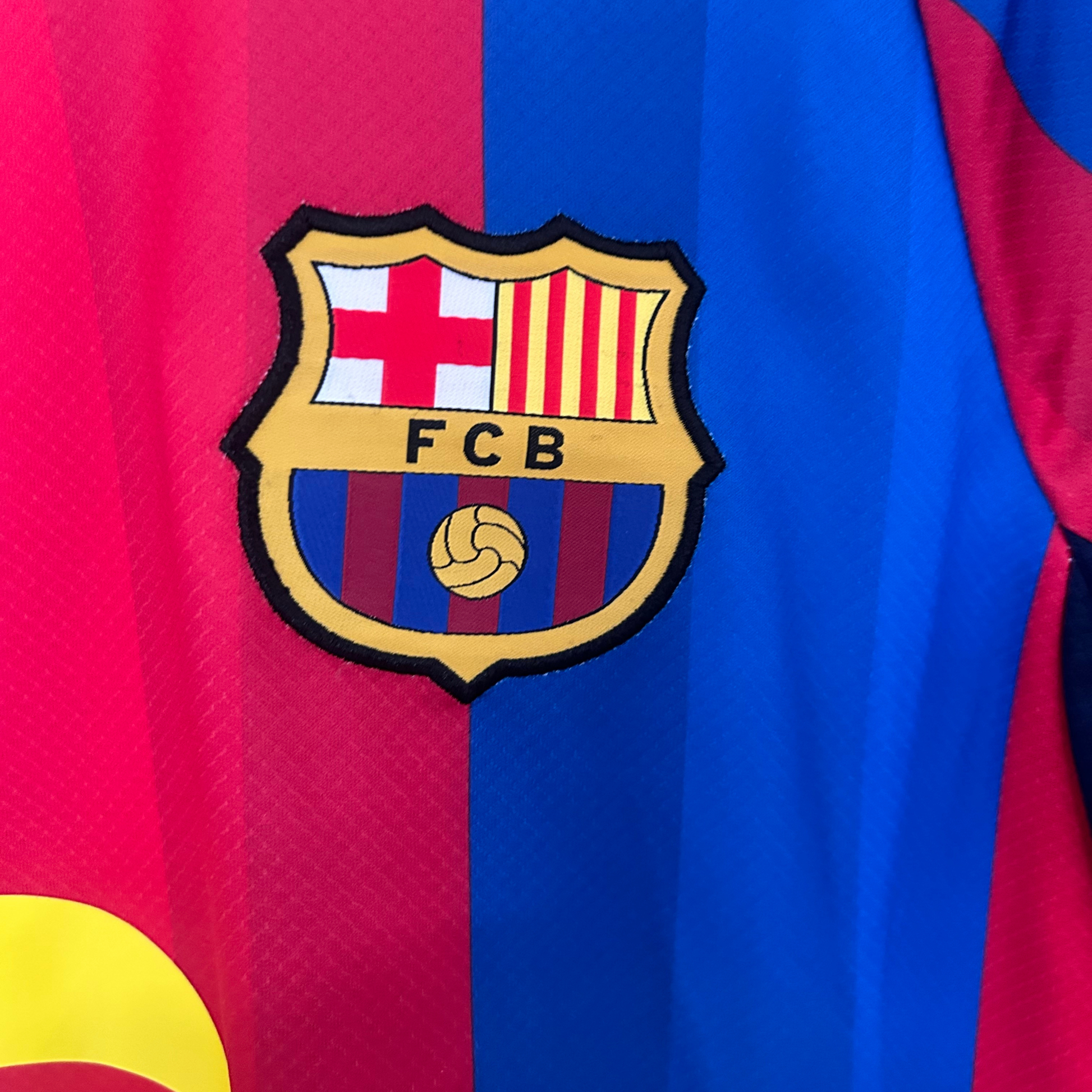 FC Barcelona home kit 2026/27 by ELVN featuring the iconic blue and claret jersey with team crest and matching shorts.