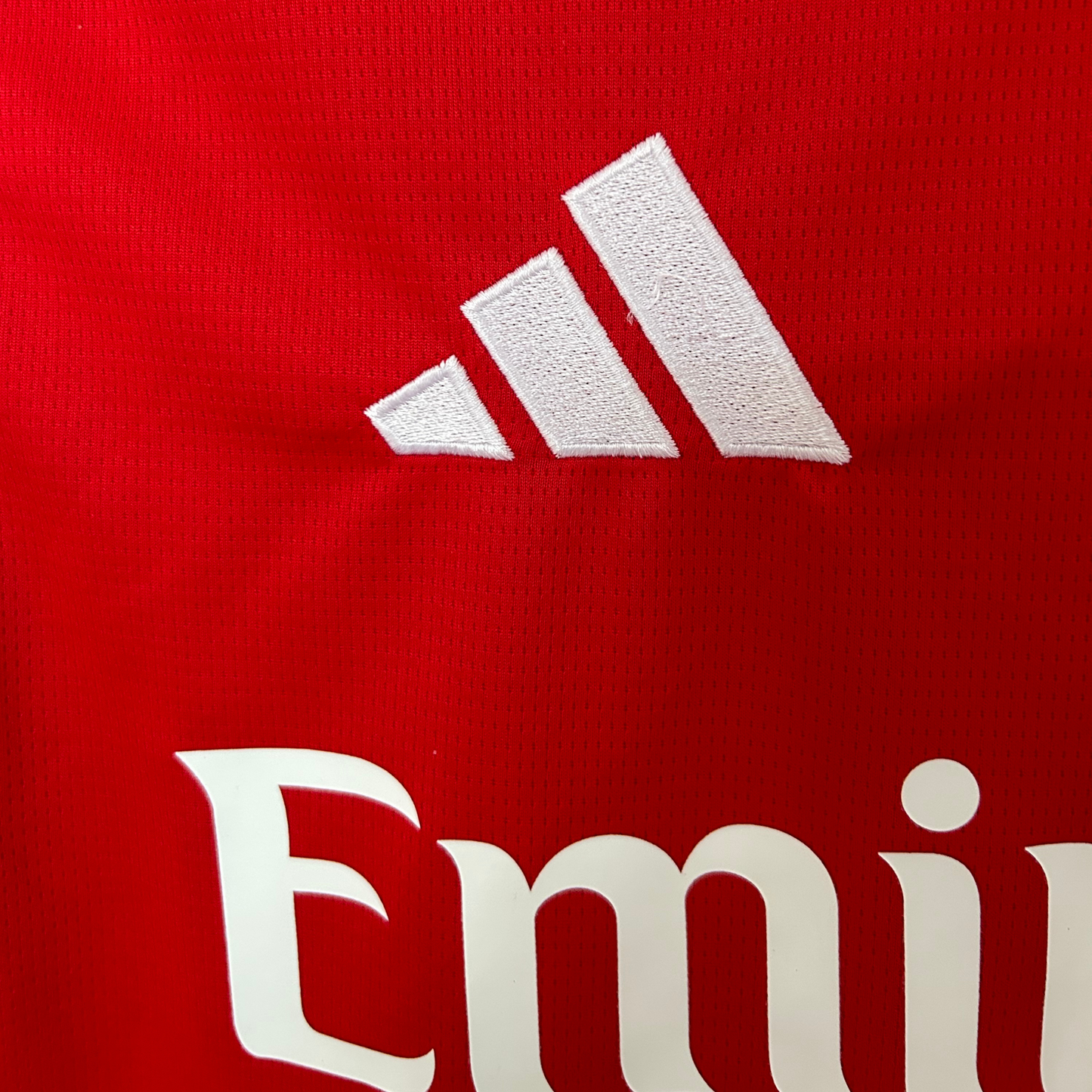 Elvn Arsenal 2026/27 home kit featuring the team crest, red jersey with white sleeves, and matching shorts.