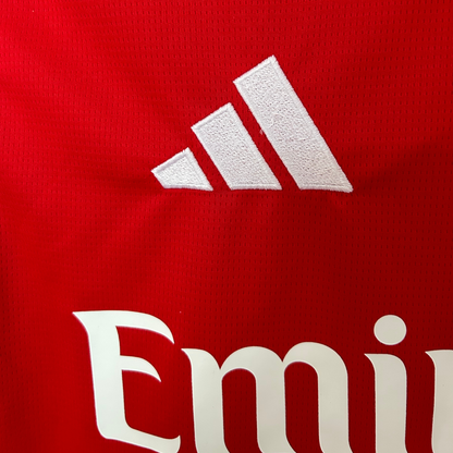 Elvn Arsenal 2026/27 home kit featuring the team crest, red jersey with white sleeves, and matching shorts.