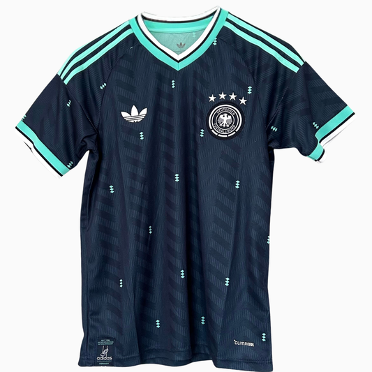 Germany Away Kit 2026 by ELVN, featuring the team's official football jersey in white with black and red accents.