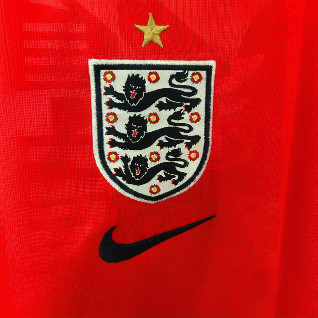 England away soccer kit 2026 by ELVN, featuring blue jersey with team crest and matching shorts on a plain background.