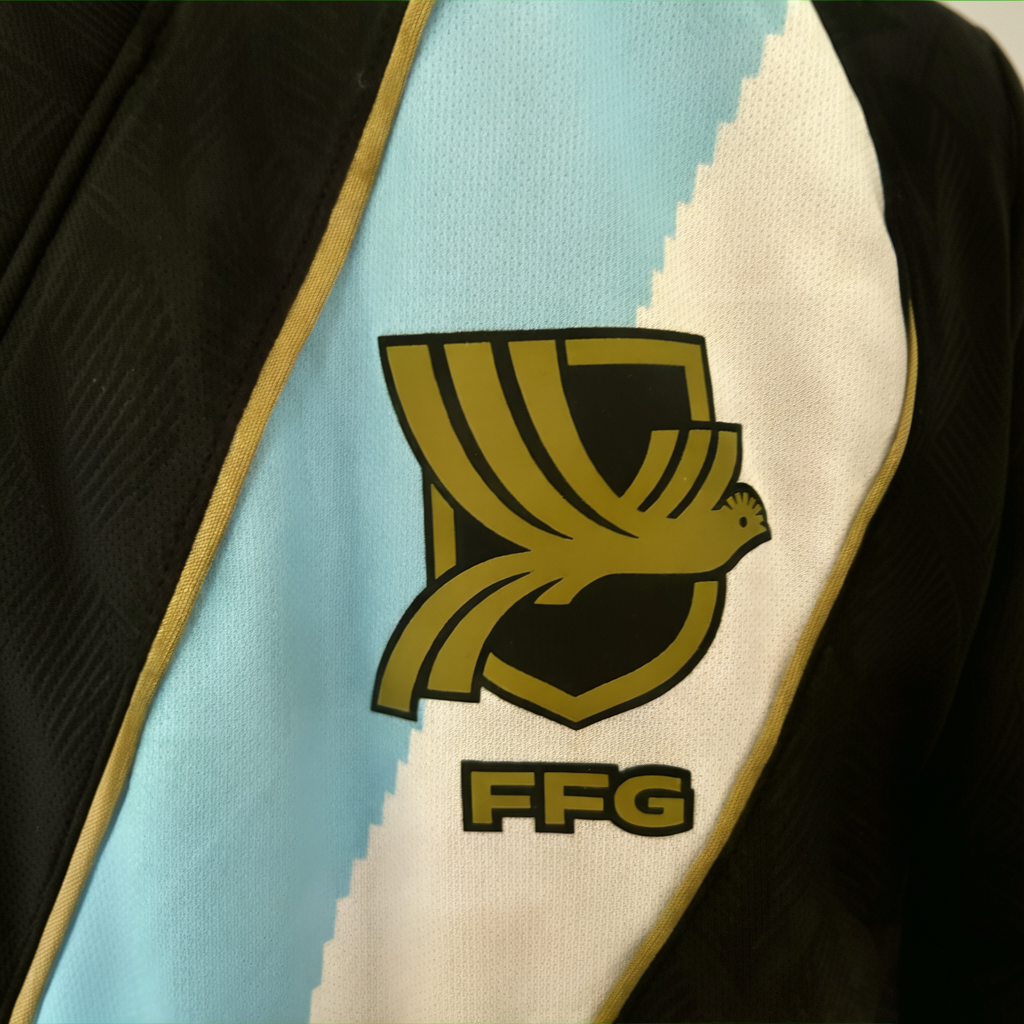 Elvn Guatemala Away Kit 2026 soccer jersey displayed on a hanger, featuring team colors and design details.