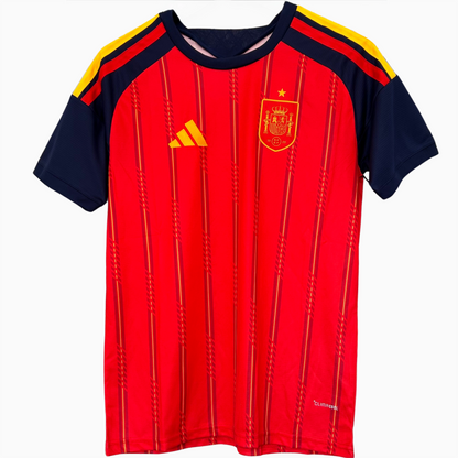 Spain home kit 2026 soccer jersey by ELVN, featuring team crest and classic red and yellow design on a plain background.