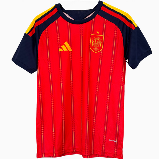 Spain home kit 2026 soccer jersey by ELVN, featuring team crest and classic red and yellow design on a plain background.