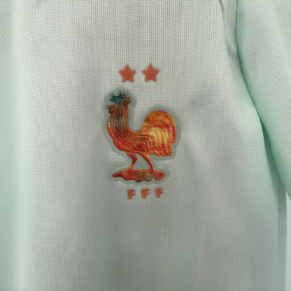 France Away Kit 2026 by ELVN, featuring the team’s blue jersey with red and white accents, displayed on a hanger.