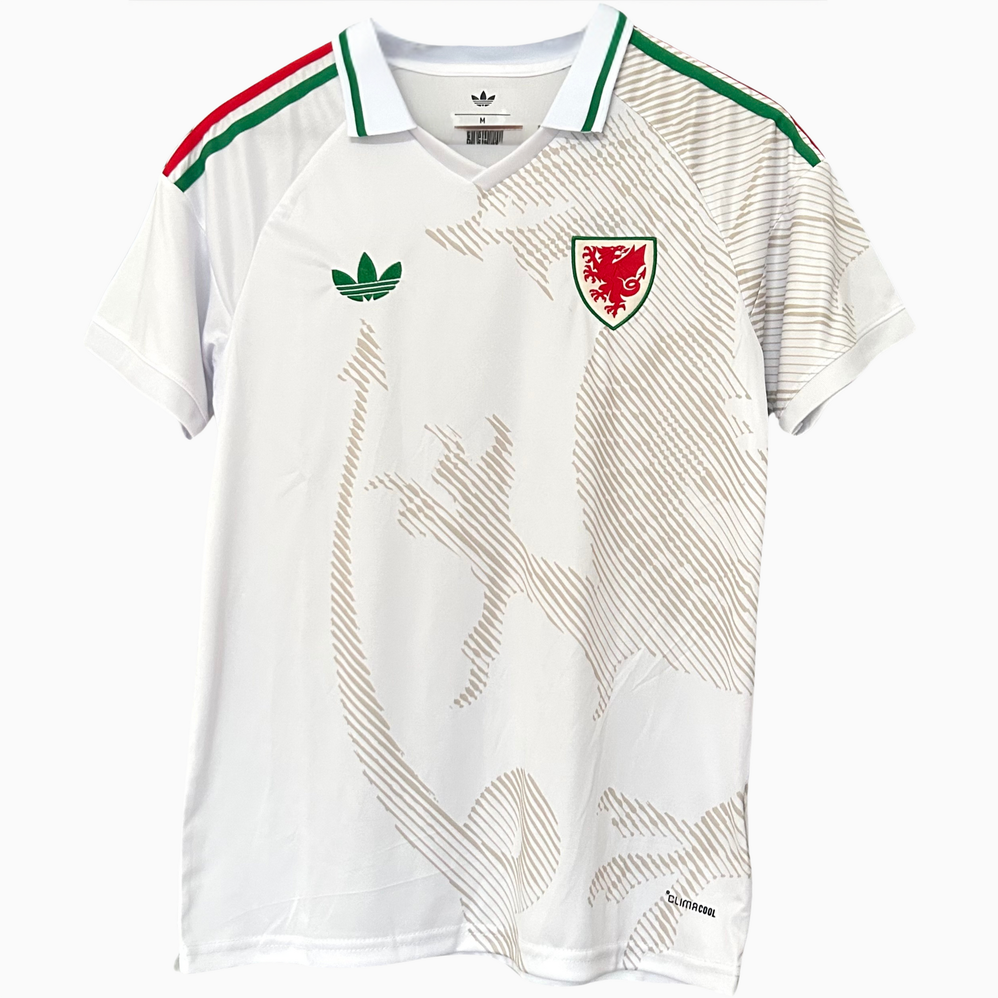 Wales Away Kit 2026 by ELVN featuring the team's blue jersey with red and white accents, displayed on a plain background.
