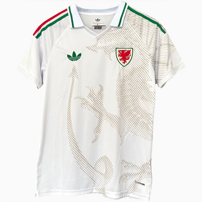 Wales Away Kit 2026 by ELVN featuring the team's blue jersey with red and white accents, displayed on a plain background.